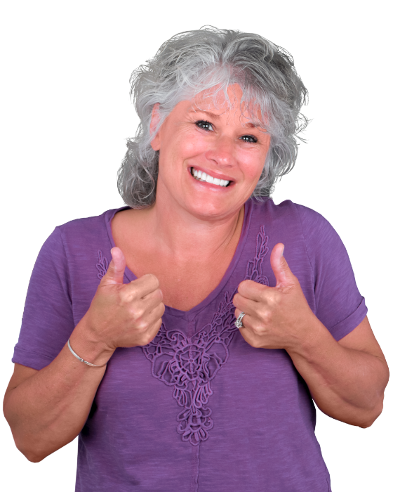 elder woman smiling with her all on 4 dental prosthesis