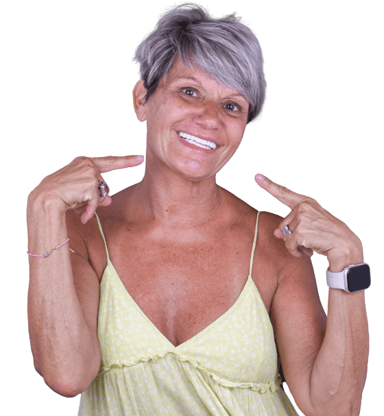 middle age woman enjoying the benefits of dental implants in Mexico