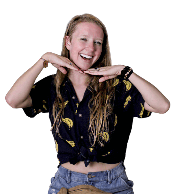 young woman smiling after getting her dental veneers in cabo san lucas