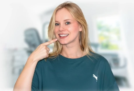Patient smiling after professional teeth whitening at Advanced Cabo Dentistry in Los Cabos, Cabo San Lucas.